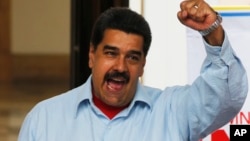 FILE - Venezuela's President Nicolas Maduro speaks during a demonstration, at Miraflores Presidential Palace in Caracas, April 7, 2016.