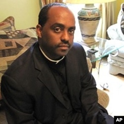 Father Reginald Jean-Marie travels to Haiti almost weekly to help earthquake survivors