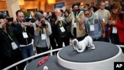 The Aibo robot dog is on display at the Sony booth after a news conference at CES International, Monday, Jan. 8, 2018, in Las Vegas. (AP Photo/John Locher)