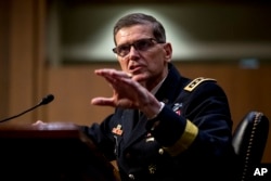 FILE - U.S. Central Command Commander Gen. Joseph Votel speaks at a Senate Armed Services Committee hearing on Capitol Hill, Feb. 5, 2019.