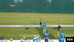 American shooter Kimberly Rhode hits her target during the women's skeet shooting competition. (VOA - P. Brewer)
