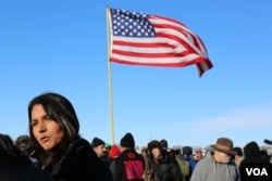 Hawaii Congresswoman Tulsi Gabbard speaks to the media after addressing veterans near the Standing Rock camp in North Dakota (E. Sarai/VOA)