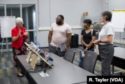Prospective students receive a guided tour of Northwest State Community College's Advanced Manufacturing Training Center in Toledo, Ohio.