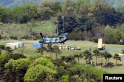 A Terminal High Altitude Area Defense (THAAD) interceptor (right) is seen in Seongju, South Korea, April 26, 2017.