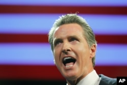 FILE - California Democratic gubernatorial candidate Gavin Newsom speaks after being elected governor of the state during an election night party in Los Angeles, Nov. 6, 2018.