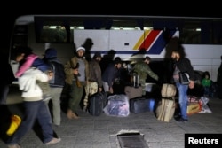 People who have evacuated from Madaya, a government-besieged town near Damascus, in an agreement between rebels and Syria's army, arrive at insurgent-held Idlib city, Syria, April 15, 2017.