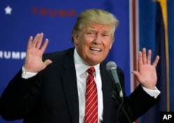 FILE - Then-presidential candidate Donald Trump speaks during a campaign stop in Keene, N.H., Sept. 30, 2015. Trump campaigned against Obamacare, saying he'd make sure everyone in the country was covered by health insurance.