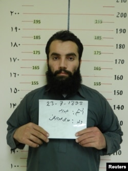 Anas Haqqani, a senior leader of the Haqqani network, arrested by the Afghan Intelligence Service in Khost province, is seen in this handout picture released Oct. 16, 2014.