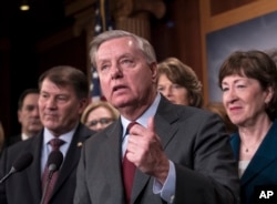 FILE - Sen. Lindsey Graham, R-S.C., speaks during a news conference at the Capitol in Washington, Feb. 15, 2018.