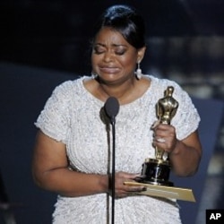 Octavia Spencer accepts the Oscar for best actress in a supporting role for “The Help” during the 84th Academy Awards on Sunday, Feb. 26, 2012, in the Hollywood section of Los Angeles.