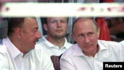 Washington Post İlham Əliyevi mürtəce siyasətdə Putinin taktikalarını təqlid etməkdə ittiham edir.