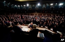 President Donald Trump arrives to deliver his State of the Union address to a joint session of U.S. Congress on Capitol Hill in Washington, Jan. 30, 2018.
