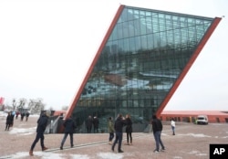 People visit the Museum of the Second World War, an ambitious new museum under creation for nine years which is almost completed, in Gdansk, Poland, Jan. 23, 2017.
