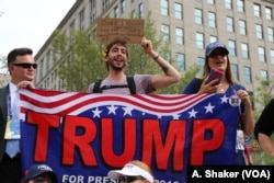 Donald Trump supporters face off with anti-Trump protesters at the Republican National Convention in Cleveland, July 21, 2016.