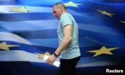 Greek Finance Minister Yanis Varoufakis arrives to make a statement in Athens, Greece July 5, 2015.