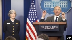 FILE - NIAID Director Dr. Anthony Fauci (R), accompanied by Dr. Anne Schuchat, Principal Deputy Director of the CDC, addresses the media in the White House Briefing Room in Washington, Feb. 8, 2016.