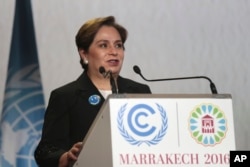 FILE - U.N. climate chief Patricia Espinosa delivers her speech during the opening session of the Climate Conference in Marrakech, Morocco, Nov. 7, 2016.