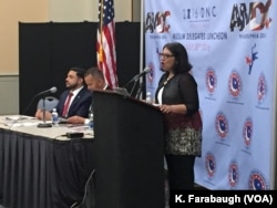 A delegate addresses the AMDC Luncheon at the Pennsylvania Convention Center during the Democratic National Convention.