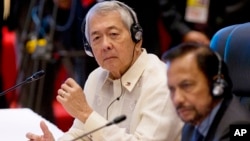 Philippines Secretary of Foreign Affairs Perfecto Yasay, left, who was standing in for Philippine's President Rodrigo Duterte attends the ASEAN-U.S. summit, a parallel summit in the ongoing 28th and 29th ASEAN Summits and other related summits at National