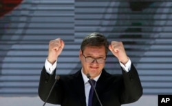 FILE - Serbian President Aleksandar Vucic gestures during a rally in the northern, Serb-dominated part of Mitrovica, Kosovo, Sept. 9, 2018.