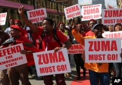 FILE - Economic Freedom Fighters supporters march in downtown Pretoria, South Africa, Nov. 2, 2016.