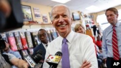 FILE - Former Vice President Joe Biden speaks to the media in Cincinnati, Ohio, June 29, 2018.