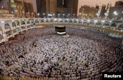 Muslims pray at the Grand Mosque ahead of the annual hajj pilgrimage in Mecca, Saudi Arabia, Aug. 29, 2017.