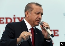 Turkey's President Recep Tayyip Erdogan addresses his supporters during an opening ceremony in Istanbul, May 6, 2016.