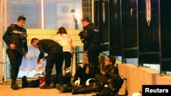 Turkish policemen at the site of an explosion in central Istanbul, Turkey, December 10, 2016.