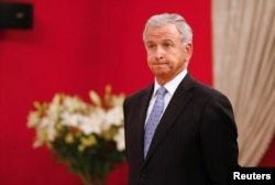 Chile's Finance Minister Felipe Larrain attends to a meeting at La Moneda Presidential Palace in Santiago, Chile, March 21, 2018.