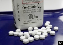 FILE - OxyContin pills, an opioid drug.