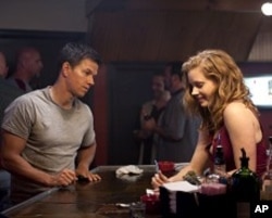 Left to right: Mark Wahlberg plays Micky Ward and Amy Adams plays Charlene Fleming in THE FIGHTER.