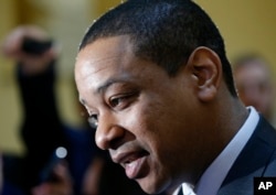 Virginia Lt. Gov. Justin Fairfax speaks to the media in the rotunda at the Capitol in Richmond, Feb. 4, 2019.