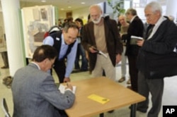 Francisco Ayala travels to Poland for a book signing following the publication of his book, 'Darwin's Gift to Science and Religion.'