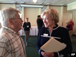Maryland congressional candidate Amie Hoeber talks with John Wiseman, moderator of a candidates forum in Cumberland, Md., Oct. 6, 2018. Hoeber is the Republican nominee for House of Representatives in the 6th Congressional District.