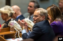 FILE - Minority Leader Peter Barca, D-Kenosha, listens as Gov. Scott Walker gives his state of the state address to a joint session of the Legislature in the Assembly chambers at the state Capitol, Jan. 10, 2017, in Madison, Wis.