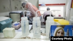 The mobile Zika surveillance project, ZIBRA, is using DNA sequencing technology in the back of its lab-equipped minibus. (Courtesy - Ricardo Funari)