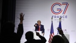 时任美国总统特朗普2019年8月出席G7峰会期间见记者（美联社）