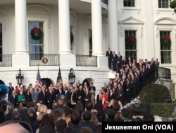 President Donald Trump praises the passage of a U.S. tax overhaul at an event on the South Lawn of the White House in Washington, Dec. 20, 2017.