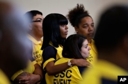 Coworkers attend a funeral for Erick Silva in Las Vegas, Nevada, Oct. 12, 2017. Silva was working as a security guard when he was killed during a mass shooting in the city Oct. 1.
