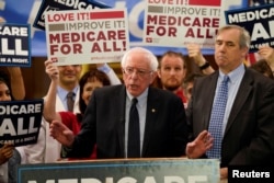 FILE - Democratic presidential candidate U.S. Sen. Bernie Sanders (I-VT) speaks at a news conference to introduce the Medicare for All Act of 2019 on Capitol Hill in Washington, April 10, 2019.