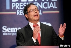 FILE - Candidate for the Presidency of Colombia Gustavo Petro speaks in the first presidential debate in Medellin, Colombia, April 3, 2018.