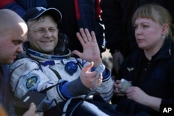Russian cosmonaut Andrei Borisenko undergoes a medical check shortly after Russia's Soyuz MS-02 space capsule landed near Dzhezkazgan, Kazakhstan, April 10, 2017.