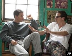 Left to right: Mark Wahlberg (as Micky Ward) with Director David O. Russell on the set of THE FIGHTER.