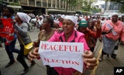 Kenyan women calling for peace and for the election to proceed jubilate outside the Kenyan Supreme Court in downtown Nairobi, Kenya, Oct. 25, 2017.