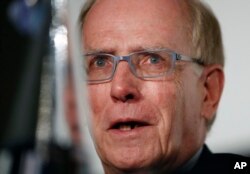 FILE - In this Dec. 9, 2016, photo, World Anti-Doping Agency investigator Richard McLaren speaks during a press conference in London.