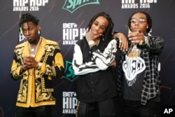 Hip Hop band Migos on the green carpet for the BET Hip Hop Awards in Atlanta.