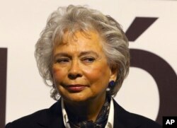 FILE - Olga Sanchez Cordero, Mexico's interior secretary, during the announcement of President Andres Manuel Lopez Obrador's Cabinet, Dec. 14, 2017, in Mexico City.