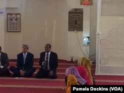 U.S. Secretary of State John Kerry, left, meets with young people at Salman Mosque in Djibouti, Djibouti, May 6, 2015.