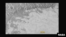 New Horizons discovers flowing ices in Pluto’s heart-shaped feature. In the northern region of Pluto’s Sputnik Planum (Sputnik Plain), swirl-shaped patterns of light and dark suggest that a surface layer of exotic ices has flowed around obstacles and into depressions, much like glaciers on Earth. (NASA/JHUAPL/SwRI)